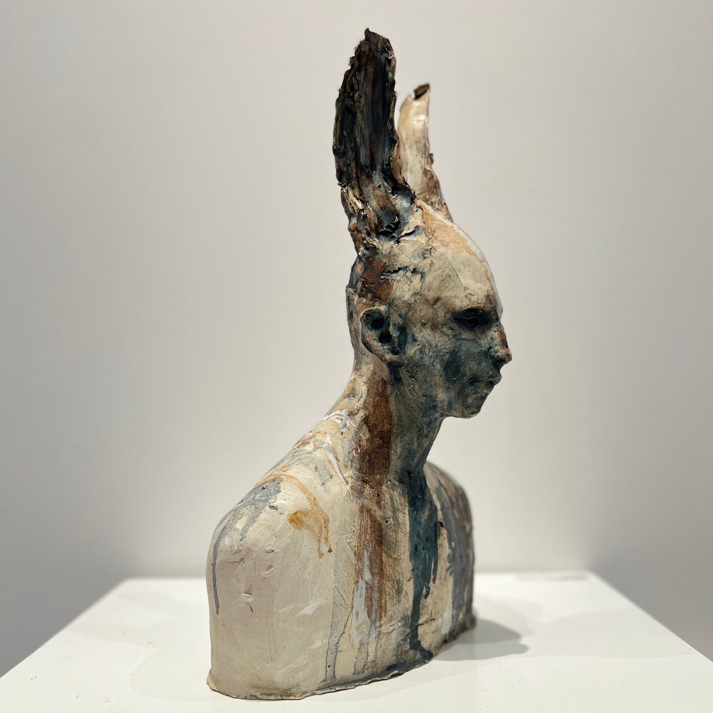 Faun with grey, white and earth tones