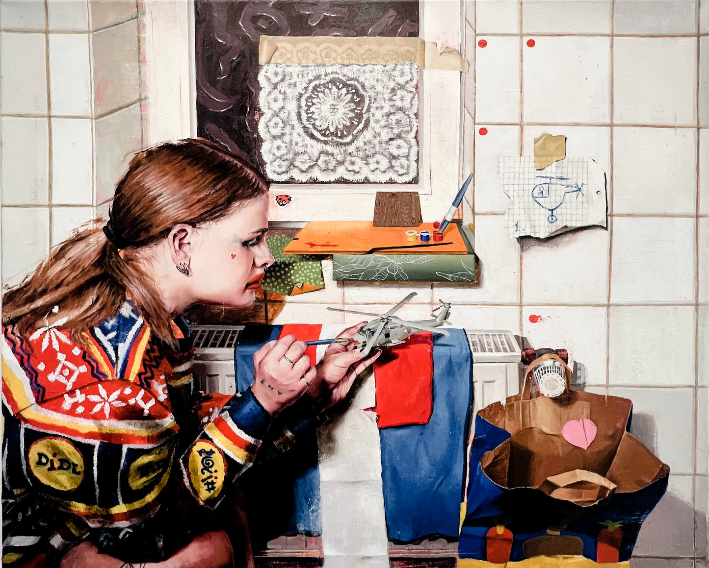 Anya does makeup on a model of the US Seahawk SH-60B Helicopter