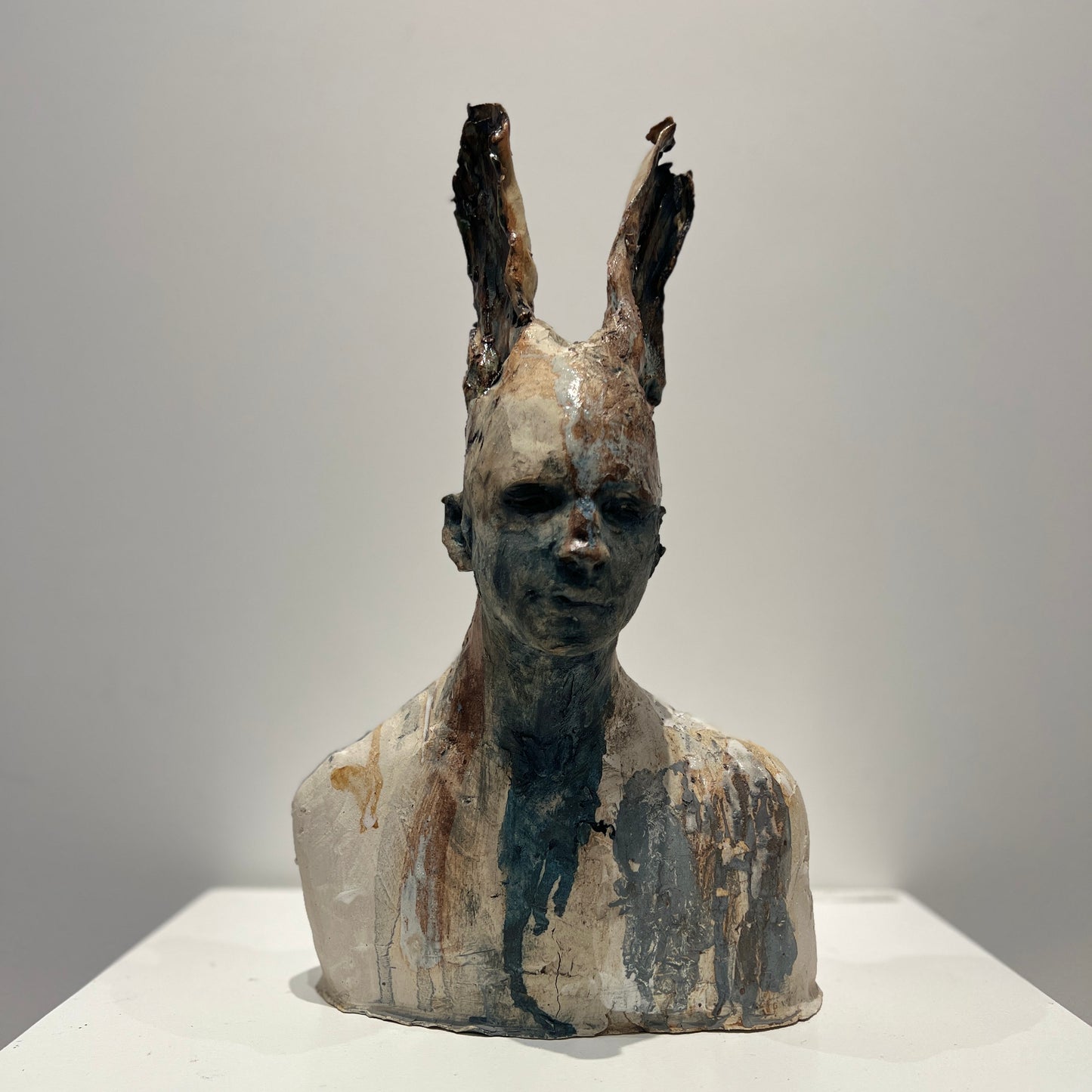 Faun with grey, white and earth tones