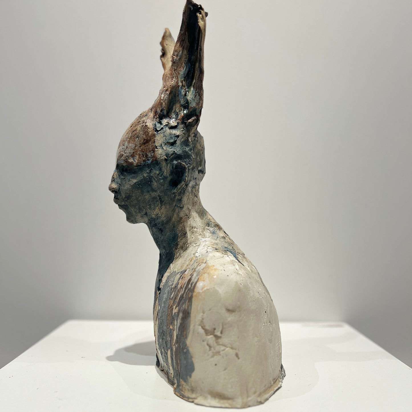 Faun with grey, white and earth tones