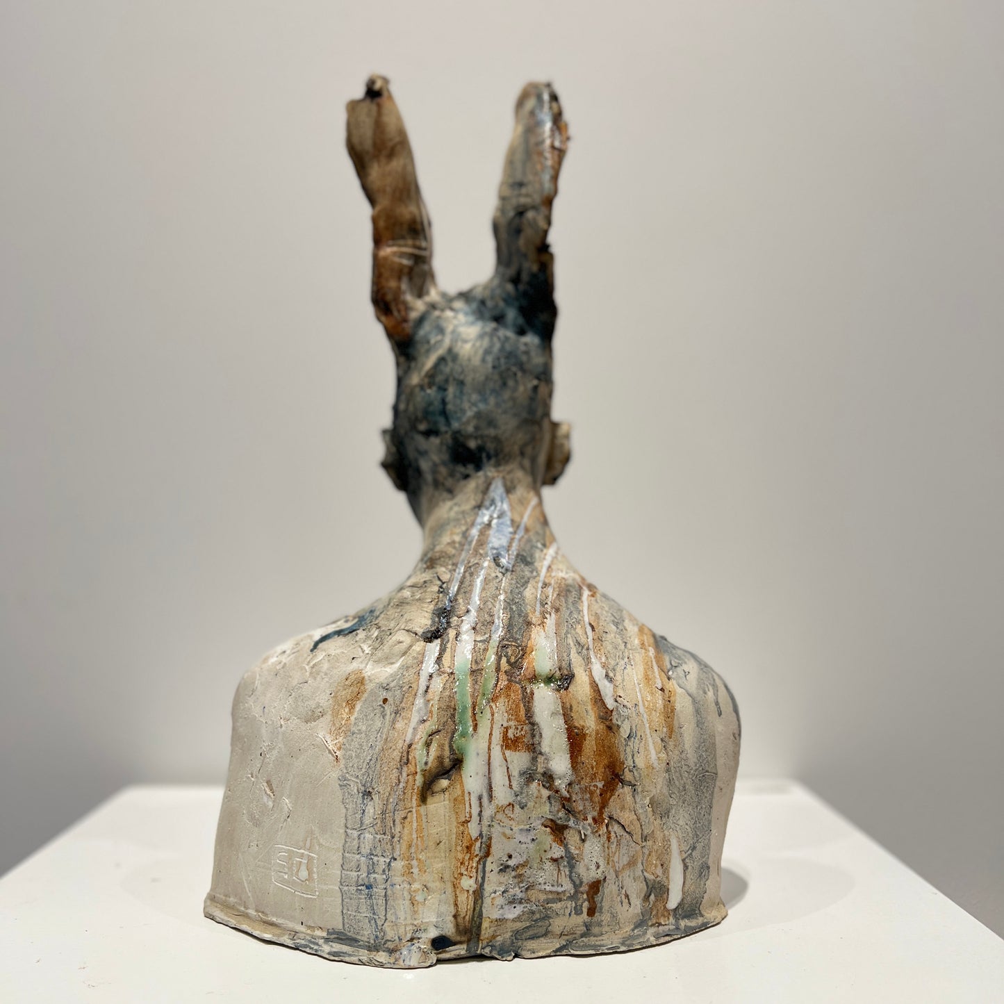 Faun with grey, white and earth tones