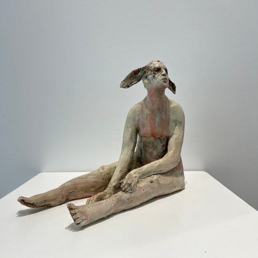 Seated dear faun