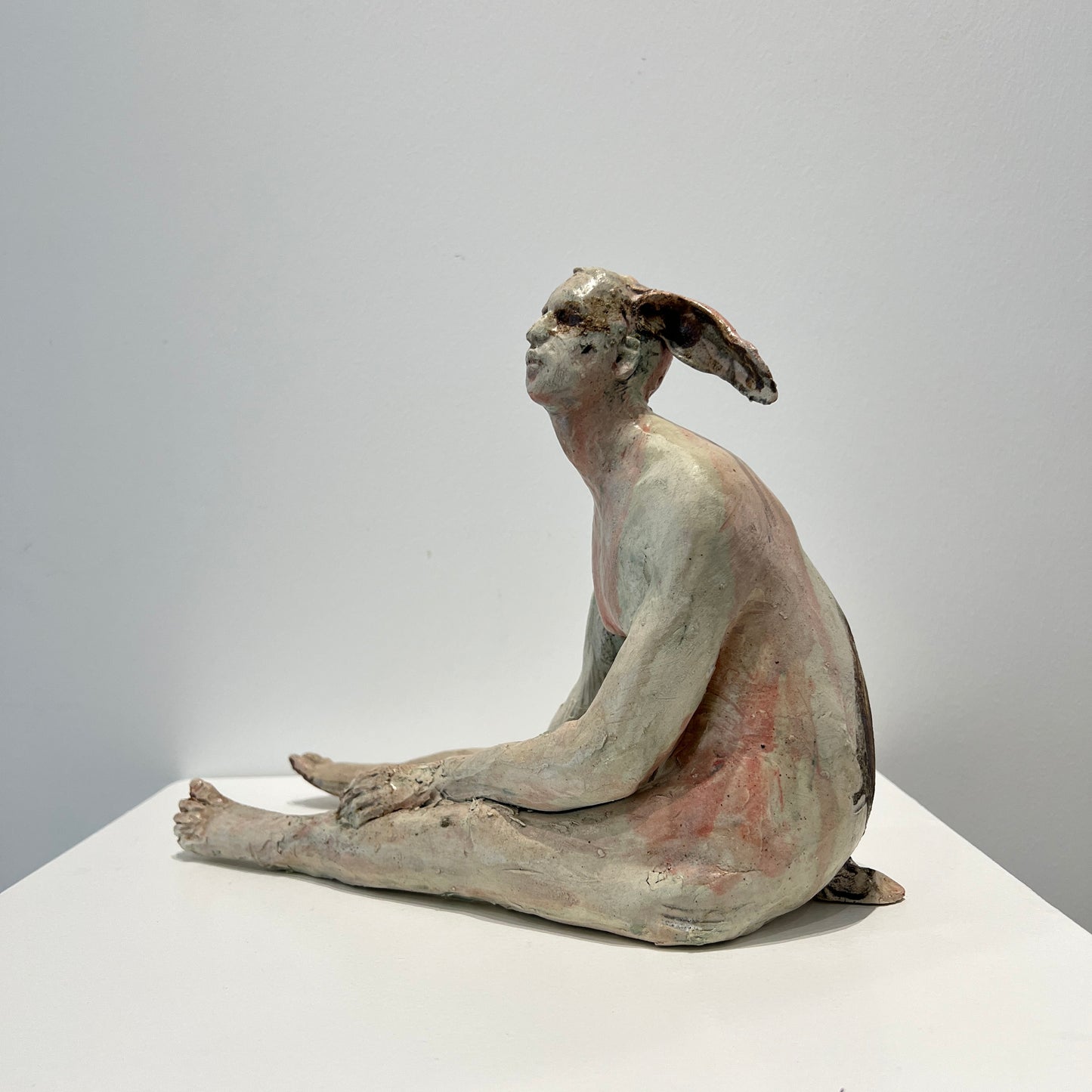 Seated dear faun