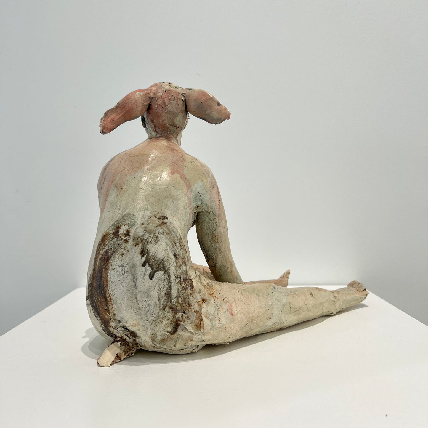 Seated dear faun