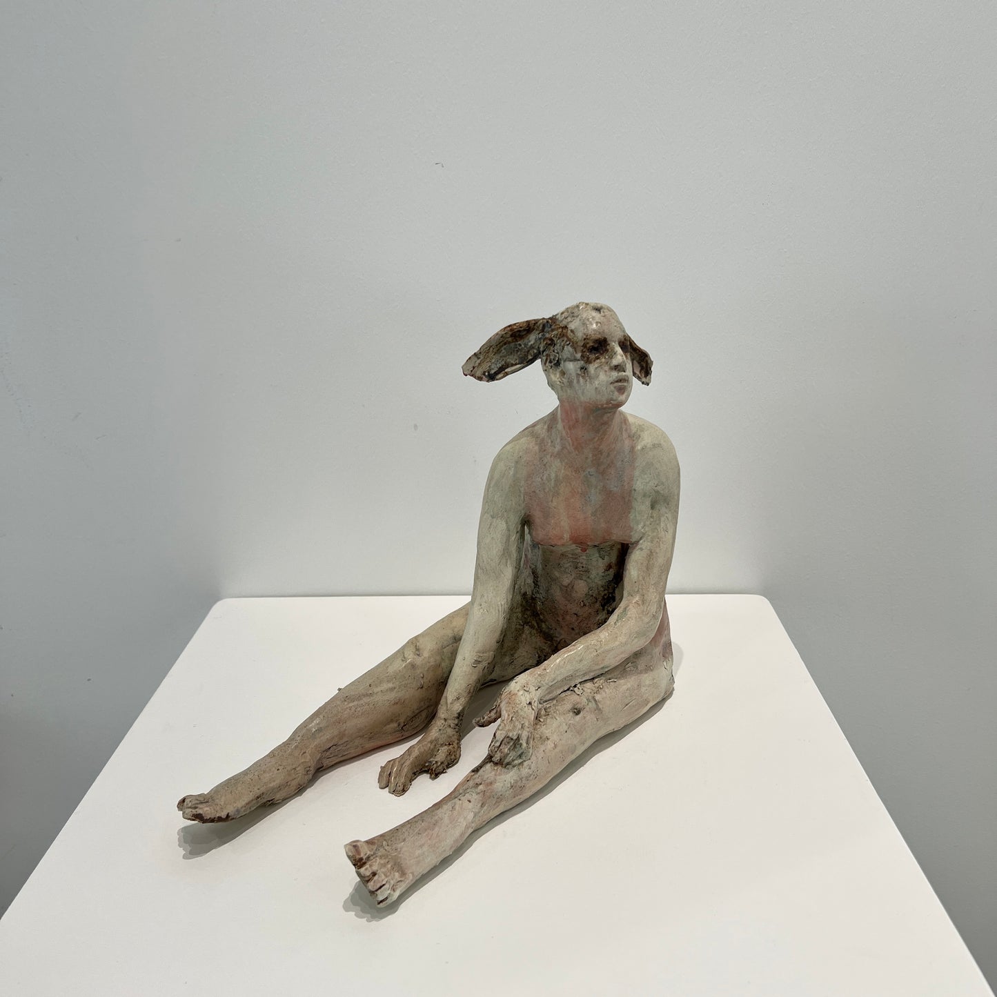 Seated dear faun